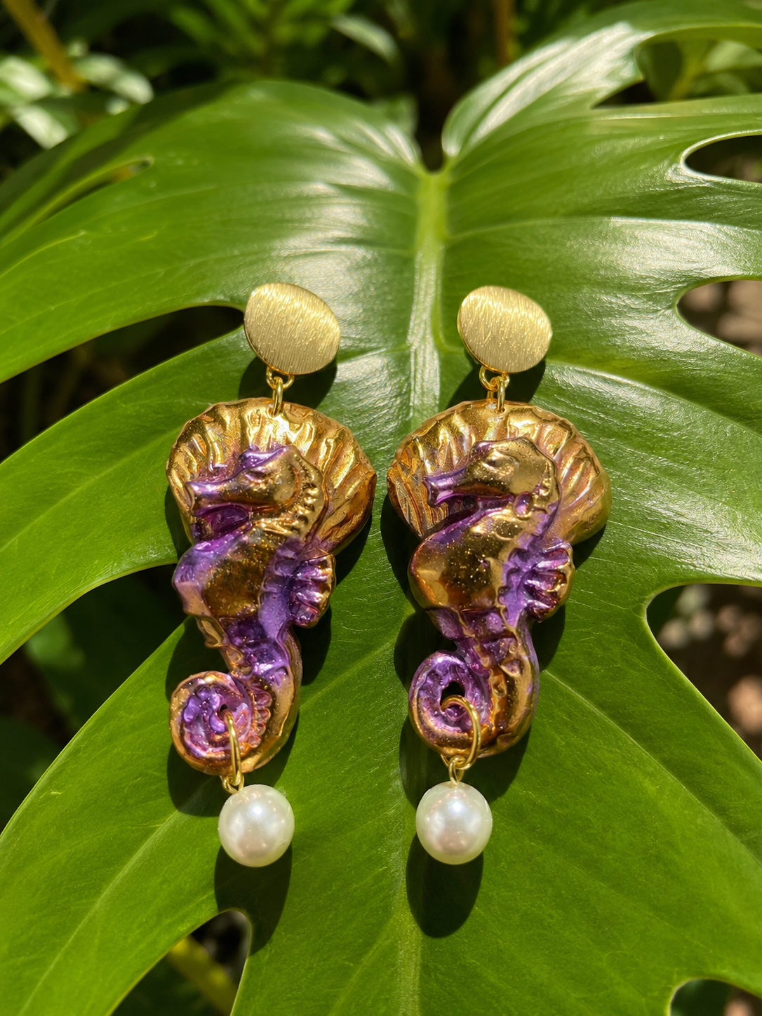 Gold and purple seashell seahorse earring